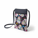 The Witches' Quest handcrafted crossbody bag featuring a vibrant, colorful sugar skull print on a black background.
