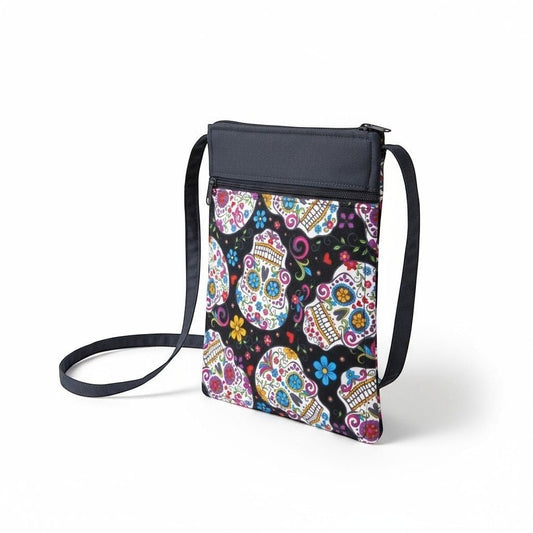 The Witches' Quest handcrafted crossbody bag featuring a vibrant, colorful sugar skull print on a black background.