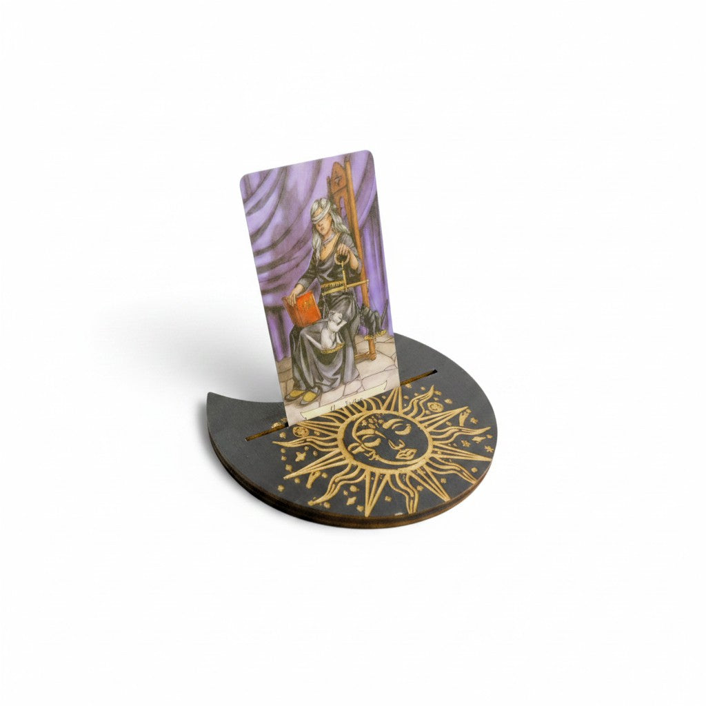The Witches' Quest wooden sun disk tarot card stand with gold laser-etched sun design holding a single tarot card.