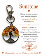 The Witches' Quest Tree of Life keychain with orange and golden sunstone gemstone chips on a silver-toned pendant.