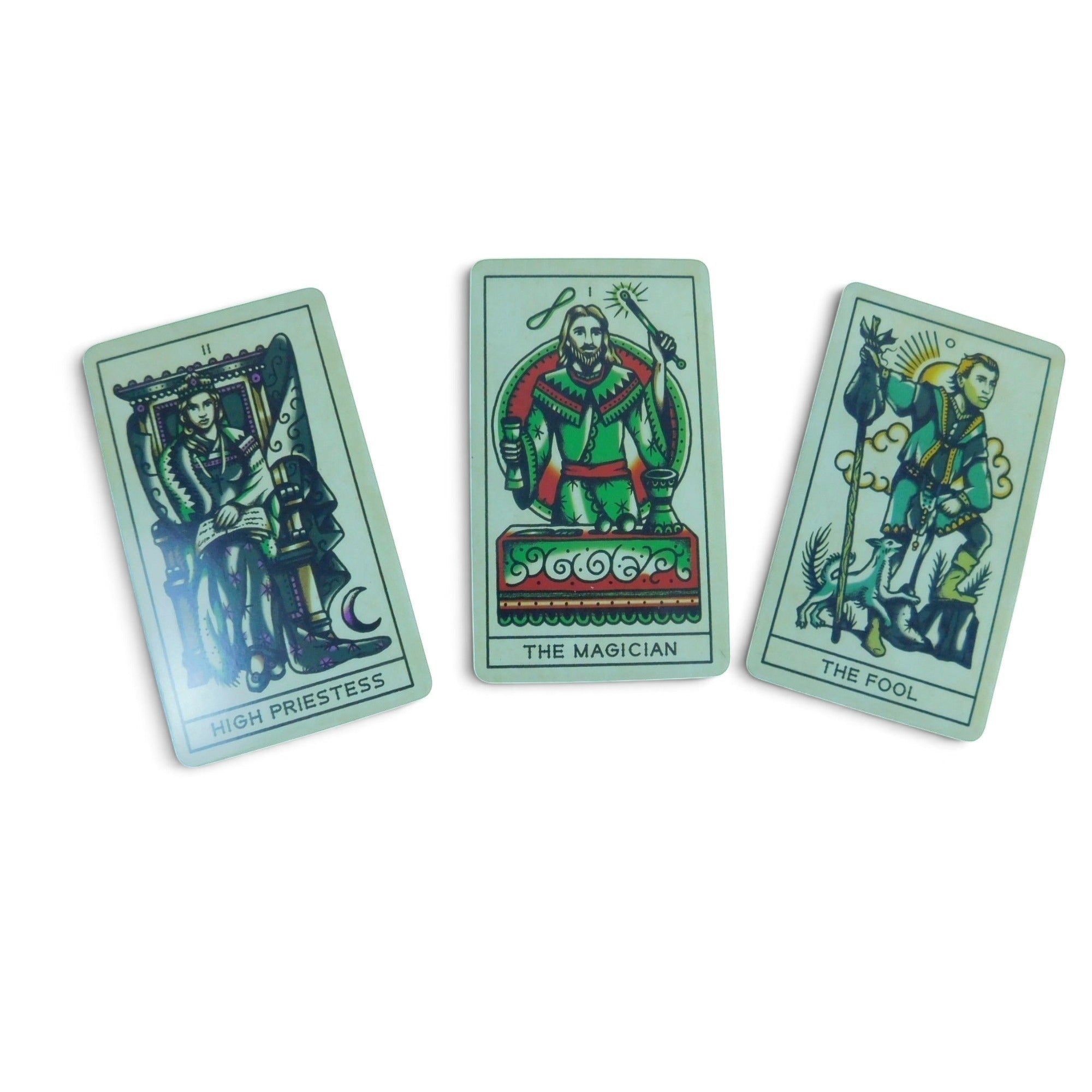 The Witches' Quest Tattoo Tarot deck featuring High Priestess, Magician, and Fool cards with vintage tattoo art style.