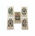 The Witches' Quest Tattoo Tarot mini deck featuring vintage tattoo-style illustrations of swords and roses on cards.