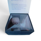 The Witches' Quest Taurus zodiac crystal gift set featuring rose quartz and clear quartz stones in a display box.