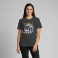 The Witches' Quest charcoal crew neck t-shirt featuring The Craft movie graphic print worn by a smiling woman.