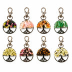 The Witches' Quest Tree of Life keychains featuring silver-toned metal pendants with various natural gemstone chips.