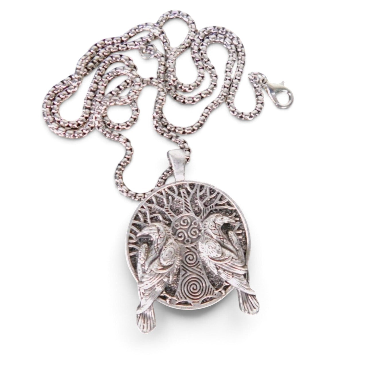 The Witches' Quest silver metal alloy pendant necklace featuring an intricate tree of life and twin ravens design.