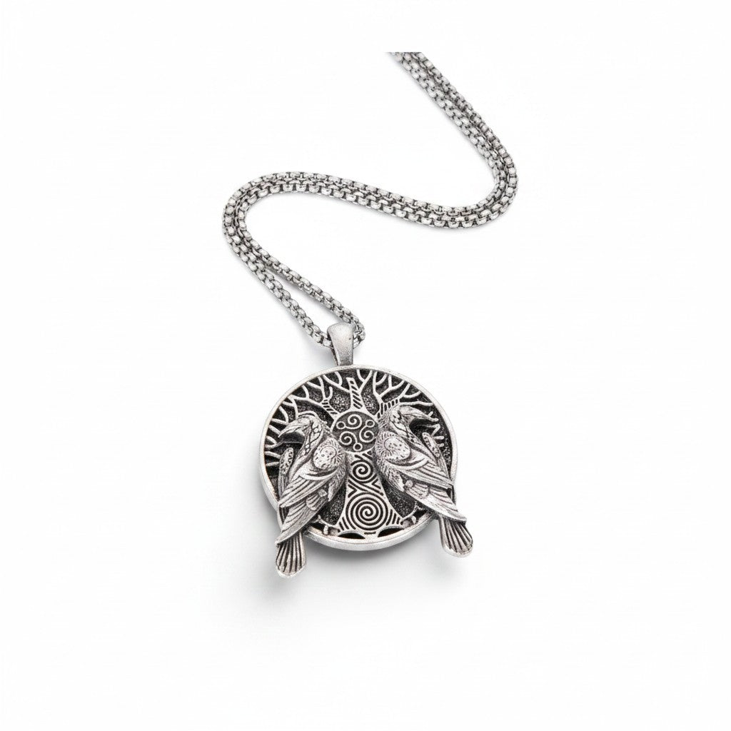 The Witches' Quest silver metal alloy pendant necklace featuring an intricate tree of life and twin ravens design.