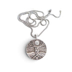 The Witches' Quest silver-tone Tree of Life pendant necklace with a 1.4-inch round charm and 23.5-inch box chain.