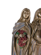 The Witches' Quest Triple Goddess statue featuring the Maiden holding flowers with a bronze finish and colorful accents.