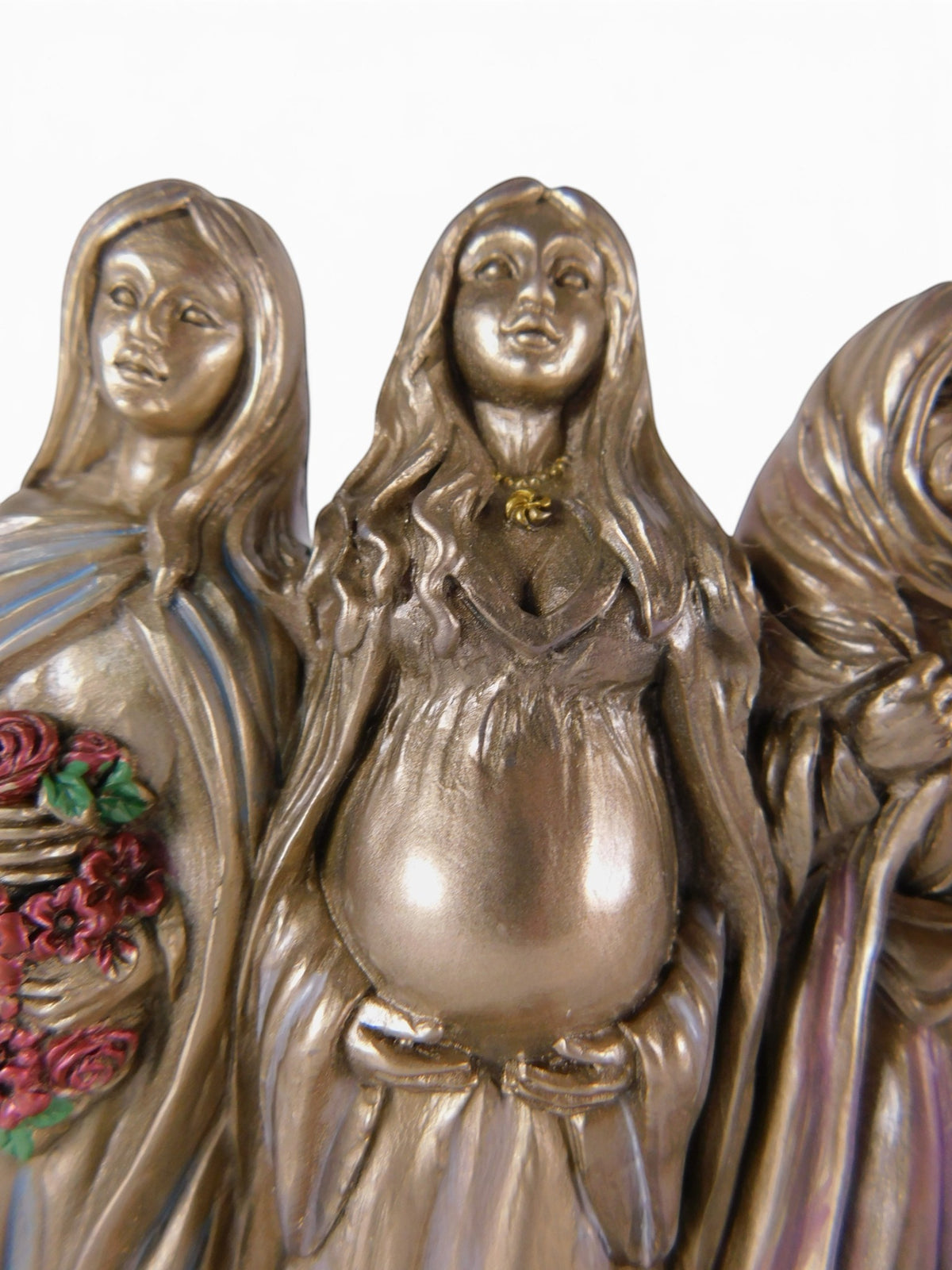 The Witches' Quest Triple Goddess statue featuring Maiden, Mother, and Crone figures in a bronze-toned resin finish.