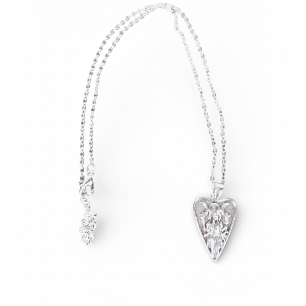 The Witches' Quest silver tone heart pendant necklace featuring a raised Triple Moon goddess relief on a cable chain