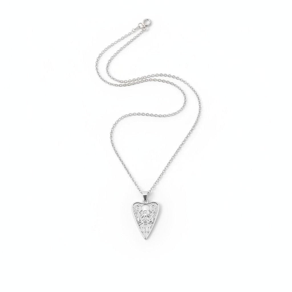 The Witches' Quest silver tone heart pendant necklace featuring a Triple Moon goddess relief on a delicate cable chain.