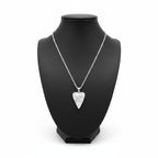 The Witches' Quest silver tone heart pendant necklace featuring a Triple Moon goddess relief on a delicate cable chain.