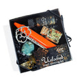 The Witches' Quest Unlocked road opening spell kit with ritual candle, skeleton key, crystals, herbs, and ritual oil.