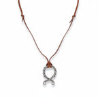 The Witches' Quest Norse Viking necklace with a twisted silver-tone oval pendant on a slim brown leather cord.