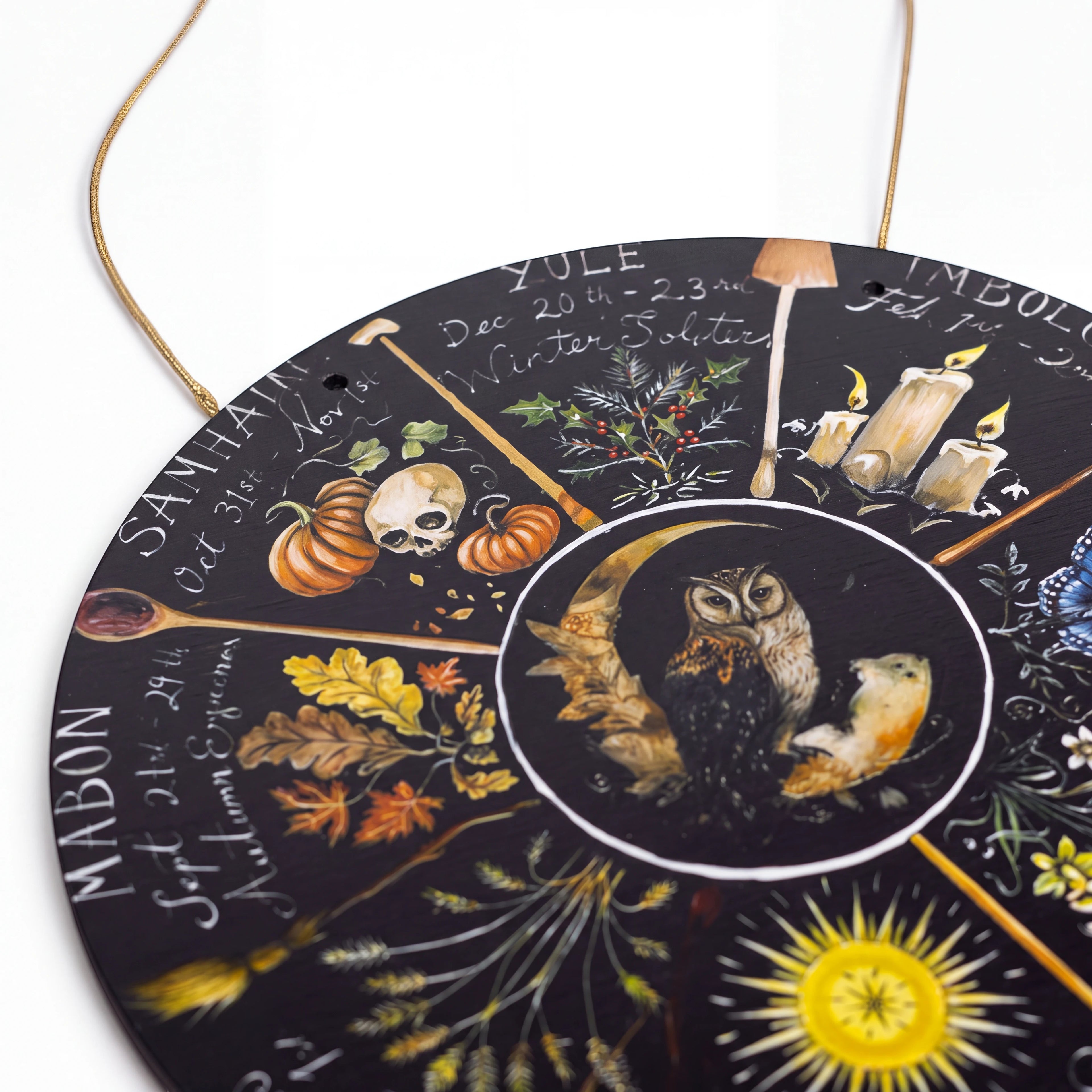 The Witches' Quest 8-inch round Wheel of the Year plaque featuring seasonal sabbat illustrations and a central owl.