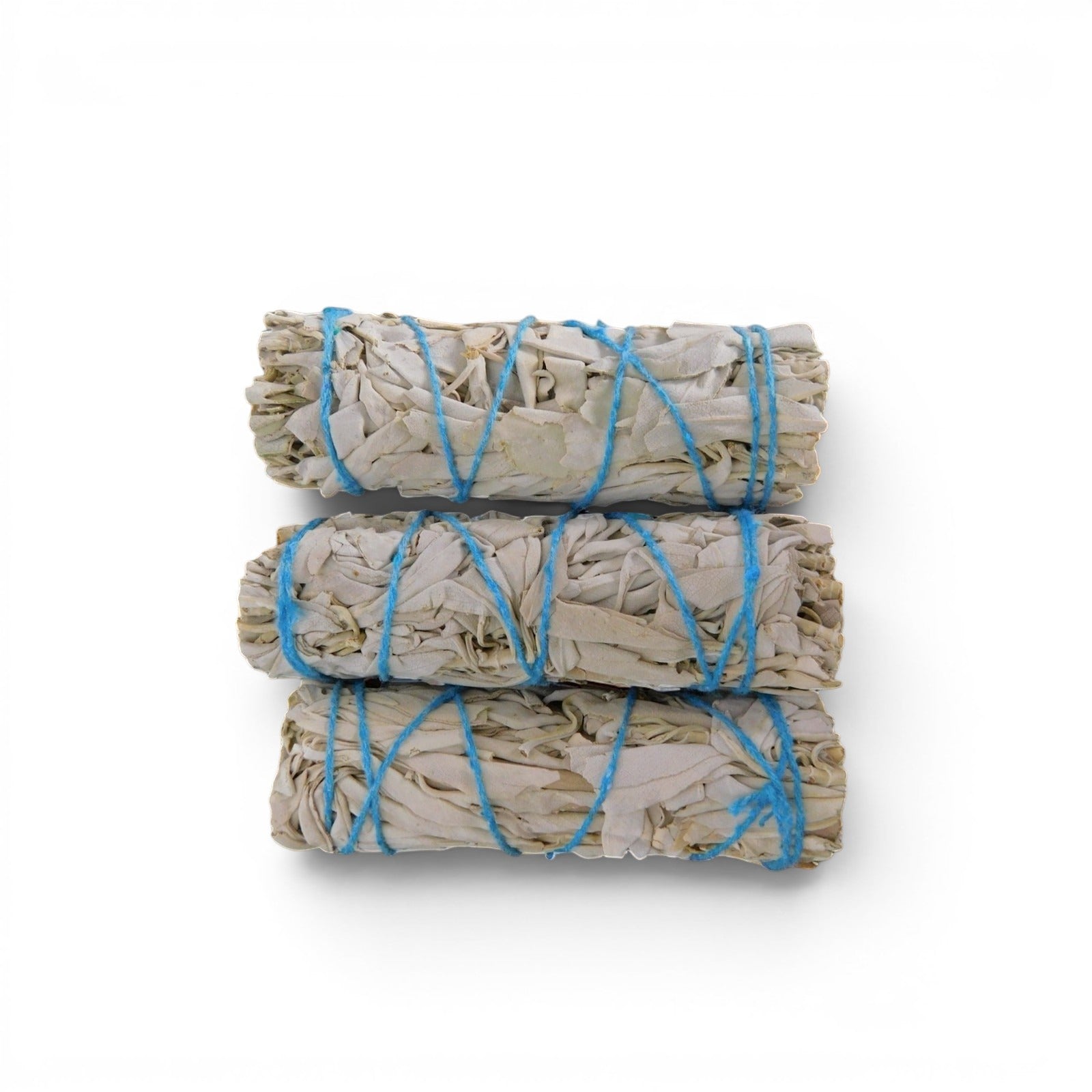 The Witches' Quest 3-pack of California white sage smudge sticks tied with blue cotton cord for energy cleansing.