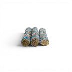 The Witches' Quest 3-pack of California white sage smudge sticks tied with blue cotton cord for energy cleansing.