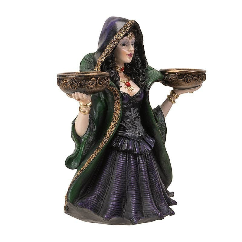 The Witches' Quest witch candle holder statue in a green and purple gown holding two ornate tea light bowls