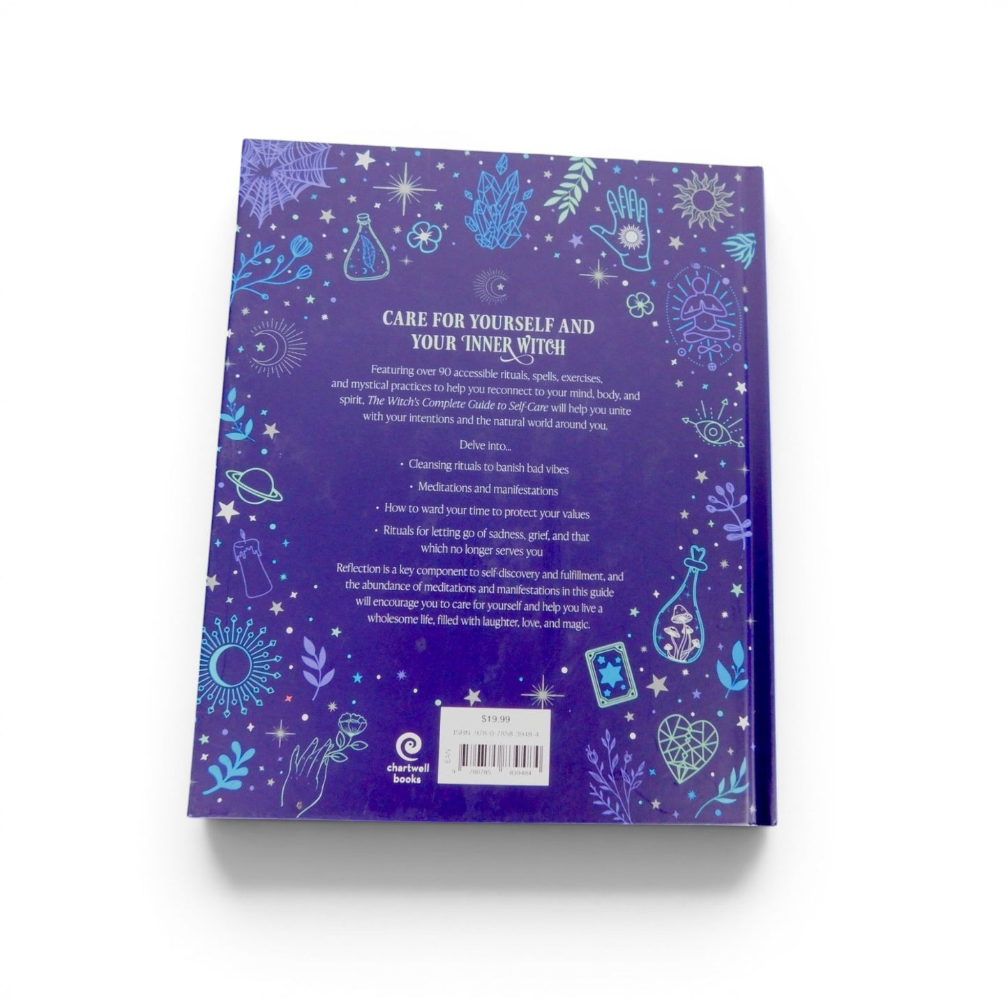 The Witches' Quest The Witch's Complete Guide To Self-Care hardcover book back cover with mystical blue illustrations