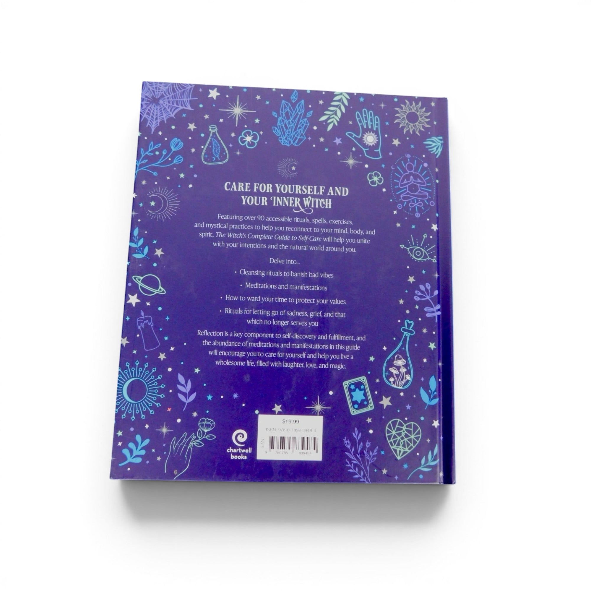 The Witches' Quest The Witch's Complete Guide To Self-Care hardcover book back cover with mystical blue illustrations