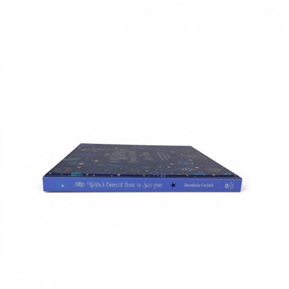 The Witches' Quest hardcover copy of The Witch's Complete Guide to Self-Care by Theodosia Corinth, blue spine view