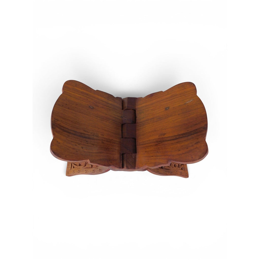 The Witches' Quest handcrafted wooden book stand with intricate carvings and a collapsible design for ritual books.