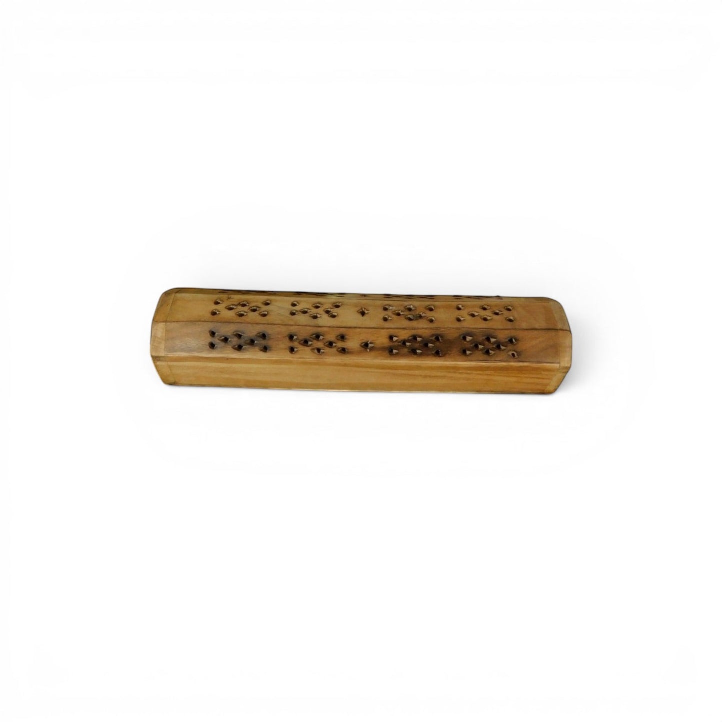 The Witches' Quest handcrafted wooden incense burner box with floral cutouts for smoke diffusion on a light table.