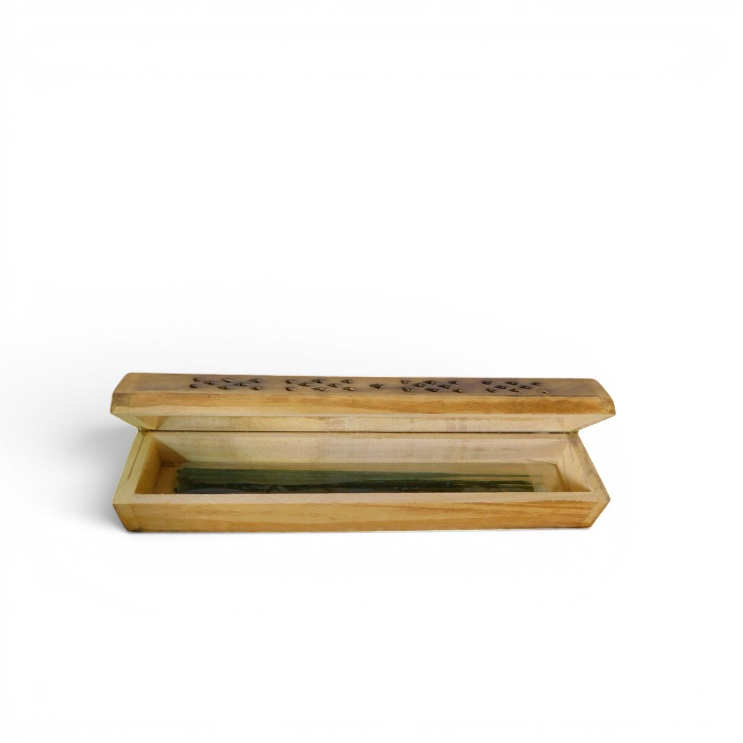 The Witches' Quest handcrafted wooden incense burner box with floral cutouts on a rustic wooden table.