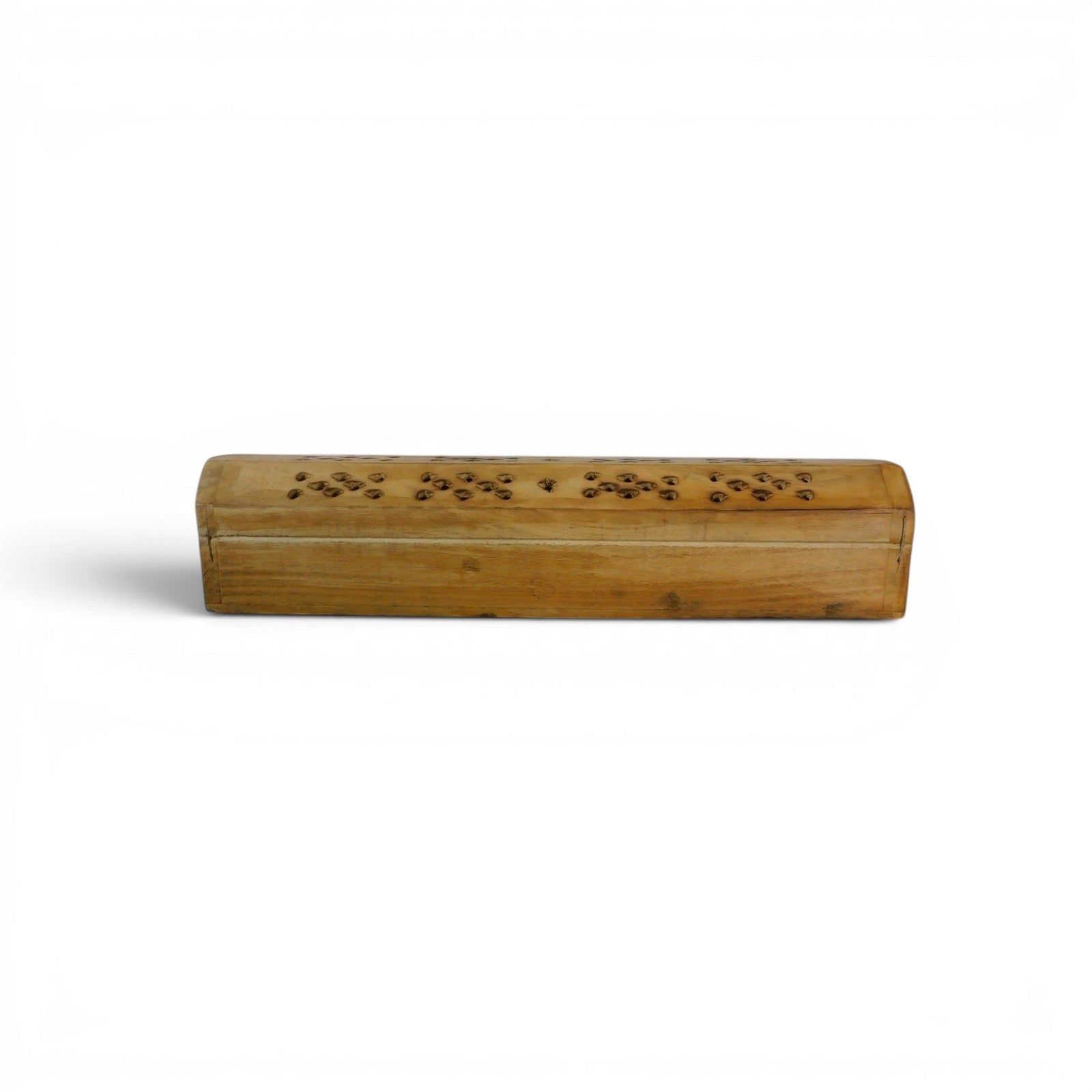 The Witches' Quest handcrafted wooden incense burner box with floral cutouts on a light wood table.