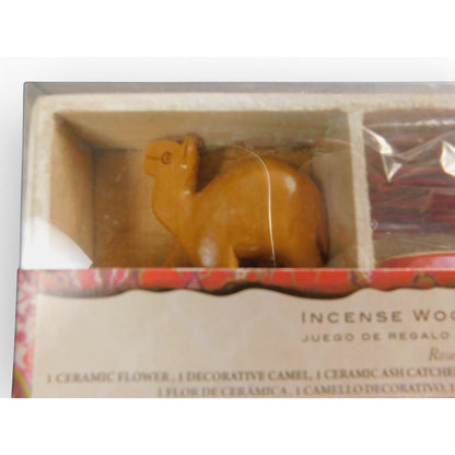 The Witches' Quest wooden gift box containing a decorative camel figurine and incense accessories for aromatherapy.