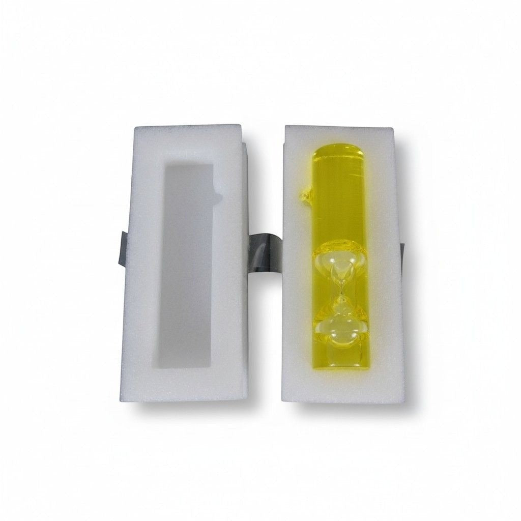 The Witches' Quest 4.5-inch yellow liquid sand timer for meditation and ritual focus in protective foam packaging.