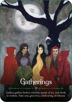 The Witches' Quest Seasons of the Witch Yule Oracle card featuring a group of people in red cloaks around a fire